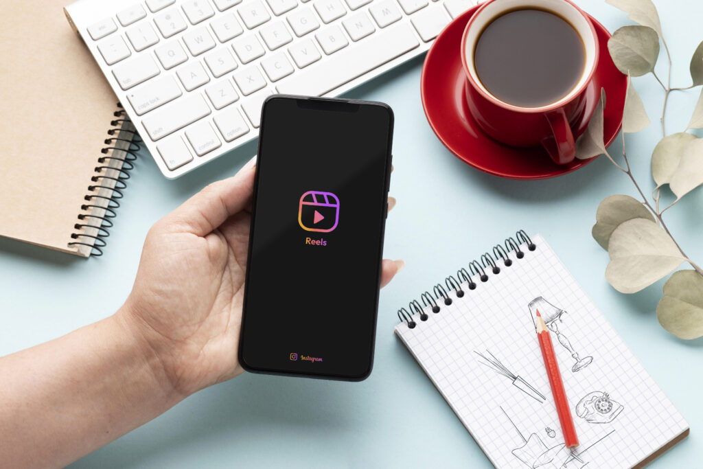 high angle hand holding smartphone